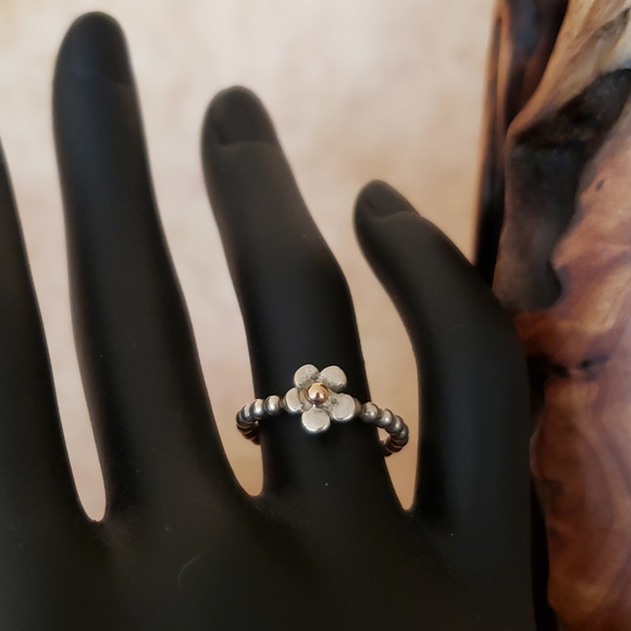 Artisan Jewelry - "Loves me, loves me not" silver floral ring